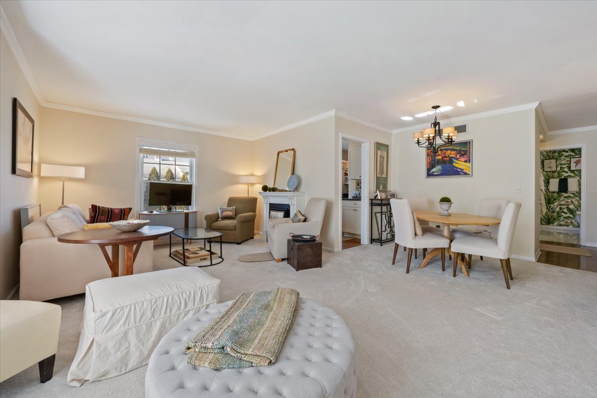 601 Ridge Road, Unit 202 Wilmette, IL 60091 - Photo 6 of 17 a living room with furniture and a table