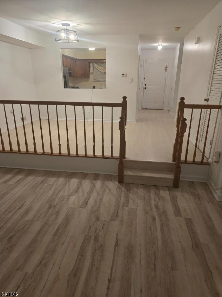 754 Darlington Drive Old Bridge, NJ 08857 - Photo 6 of 19 a view of a hallway with wooden floor