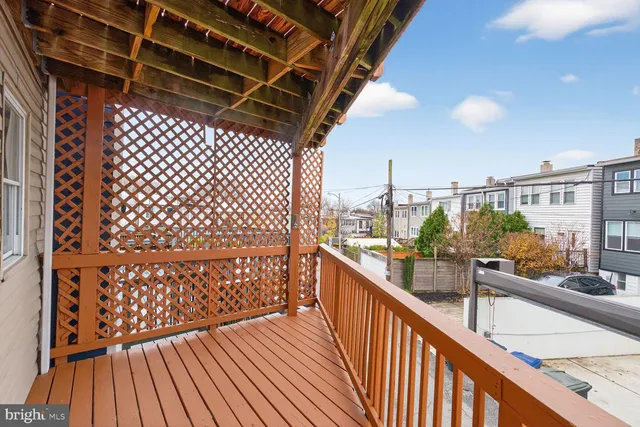 a kitchen with stainless steel appliances a sink dishwasher a stove and a microwave