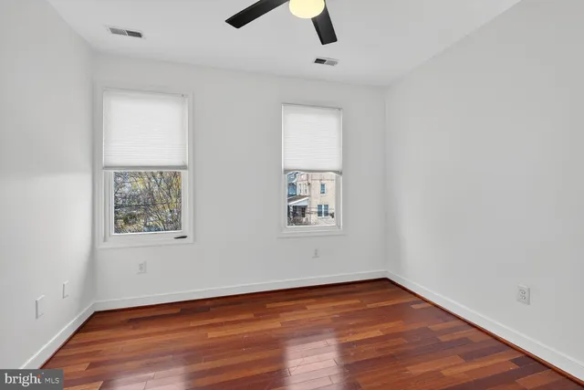 a bathroom with a shower toilet and sink