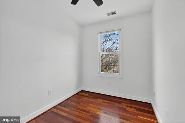 a bathroom with a sink a vanity and a mirror