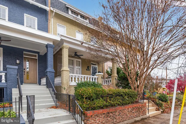 a view of a house with a street