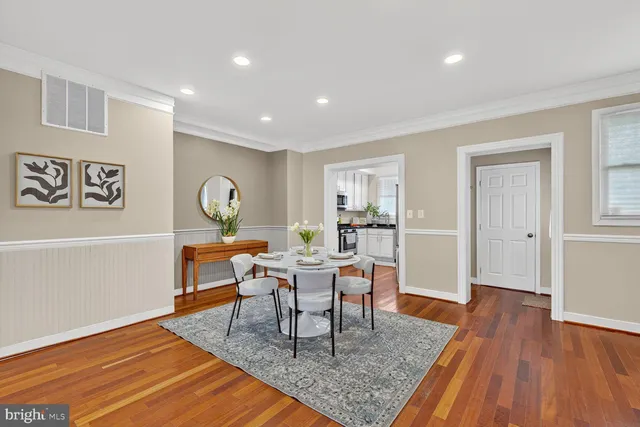 a workspace with furniture and wooden floor