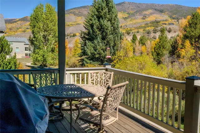 a view of a balcony with furniture