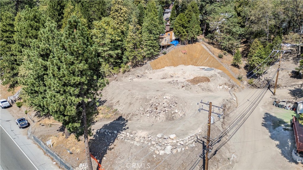 a view of a tree in front of a yard