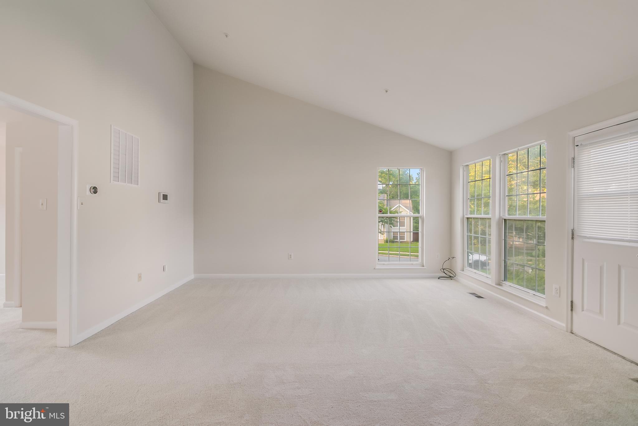 936 Millponds Court Bowie, MD 20721 - Photo 20 of 57 a view of an empty room with a window