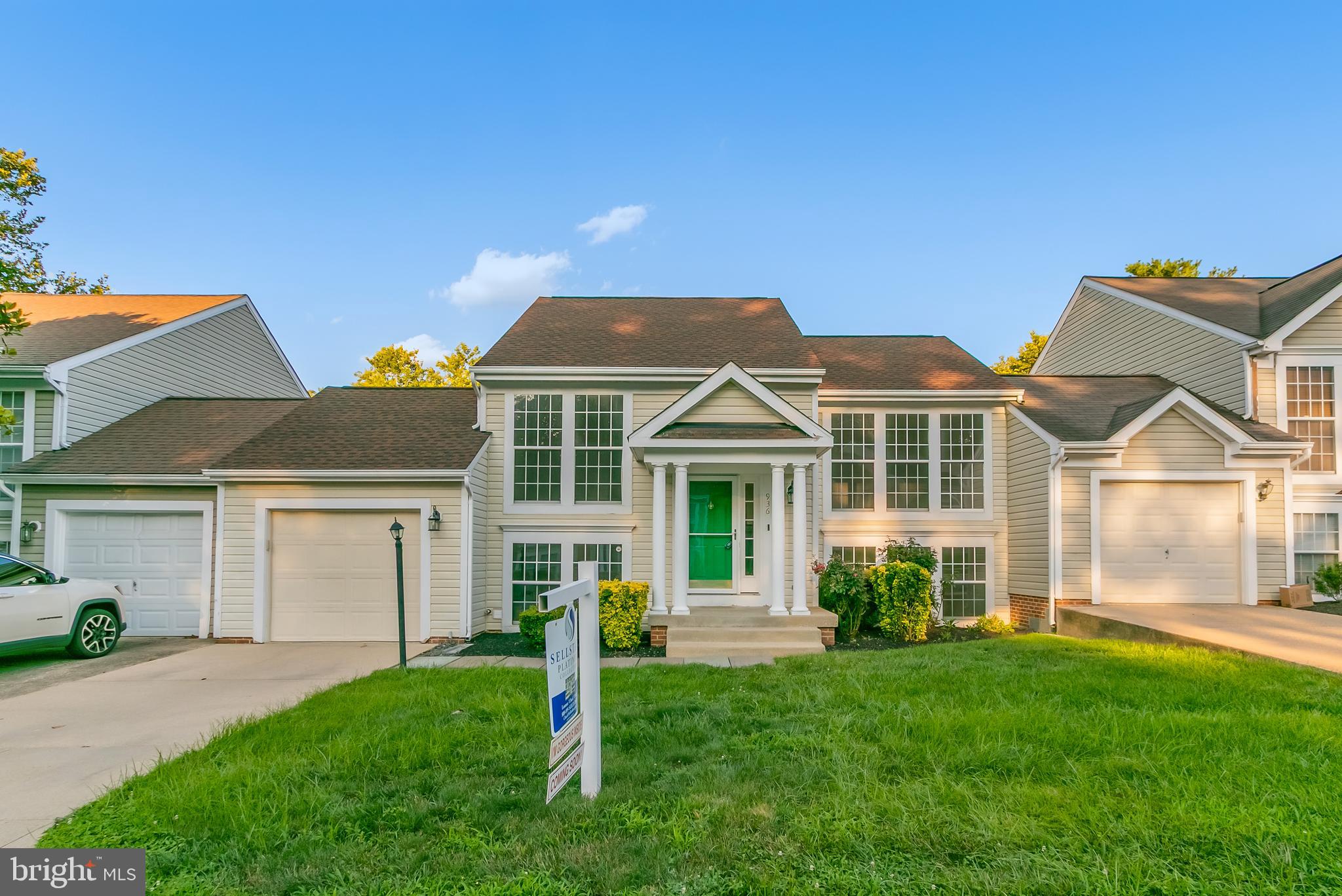 936 Millponds Court Bowie, MD 20721 - Photo 2 of 57 a front view of a house with a yard and porch