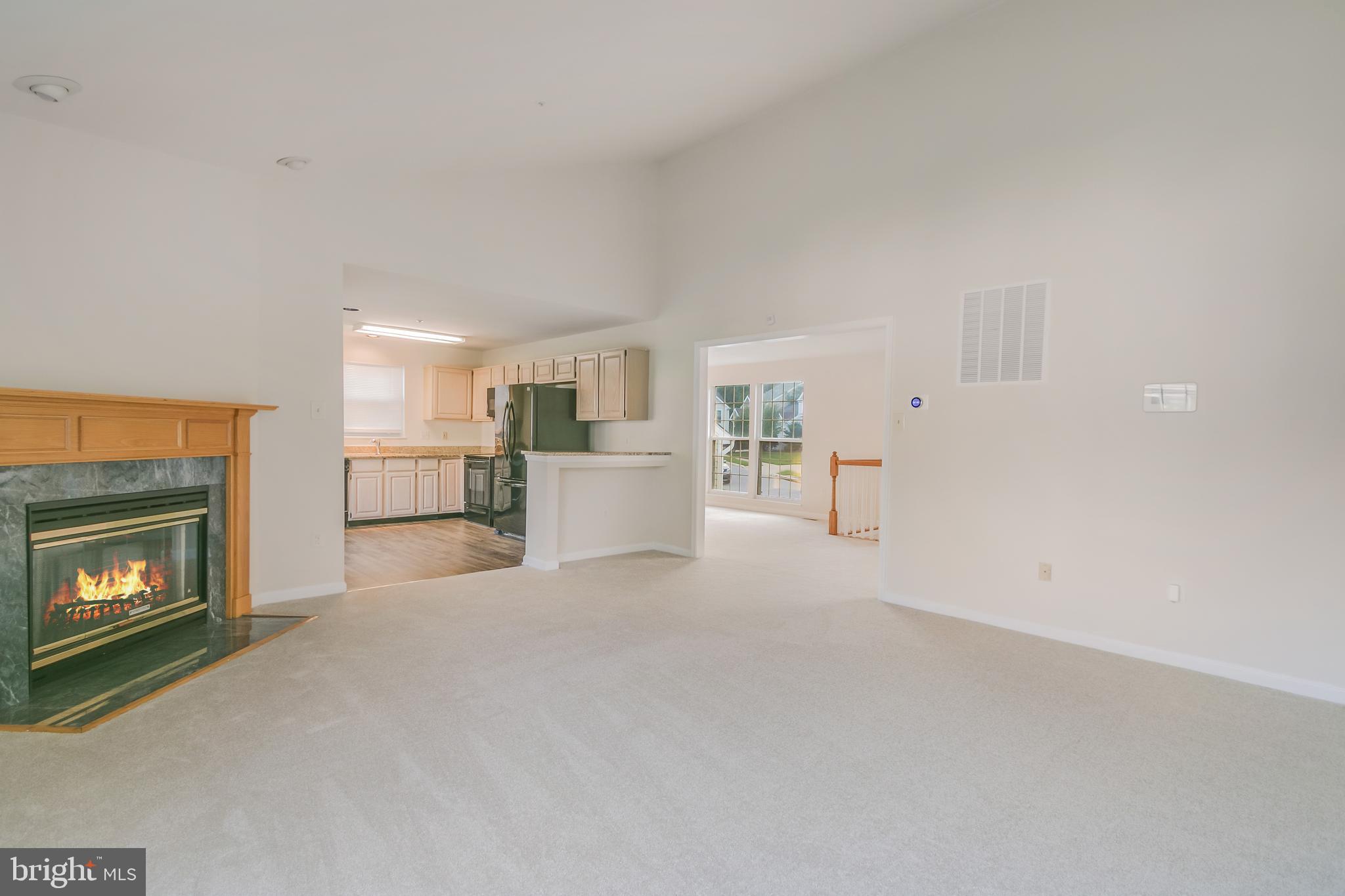 936 Millponds Court Bowie, MD 20721 - Photo 23 of 57 a view of a livingroom with a fireplace