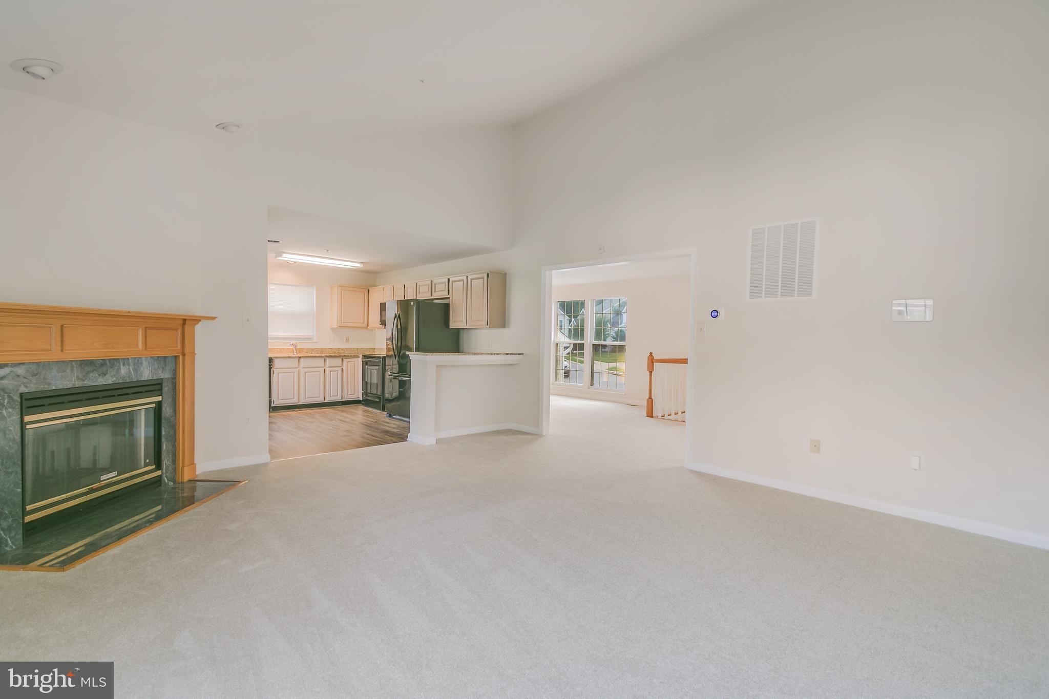 936 Millponds Court Bowie, MD 20721 - Photo 24 of 57 a view of a livingroom with a fireplace