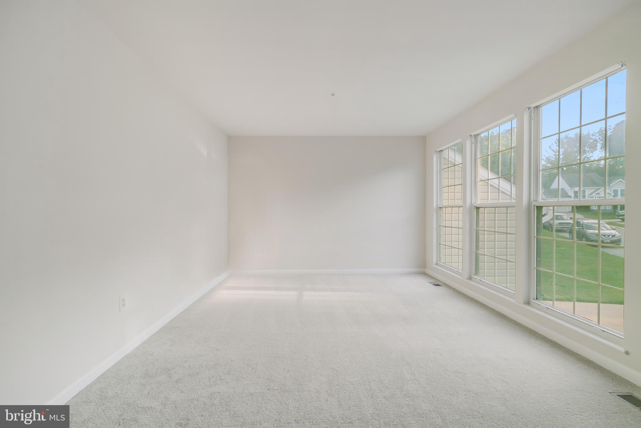 936 Millponds Court Bowie, MD 20721 - Photo 34 of 57 a view of an empty room with glass door