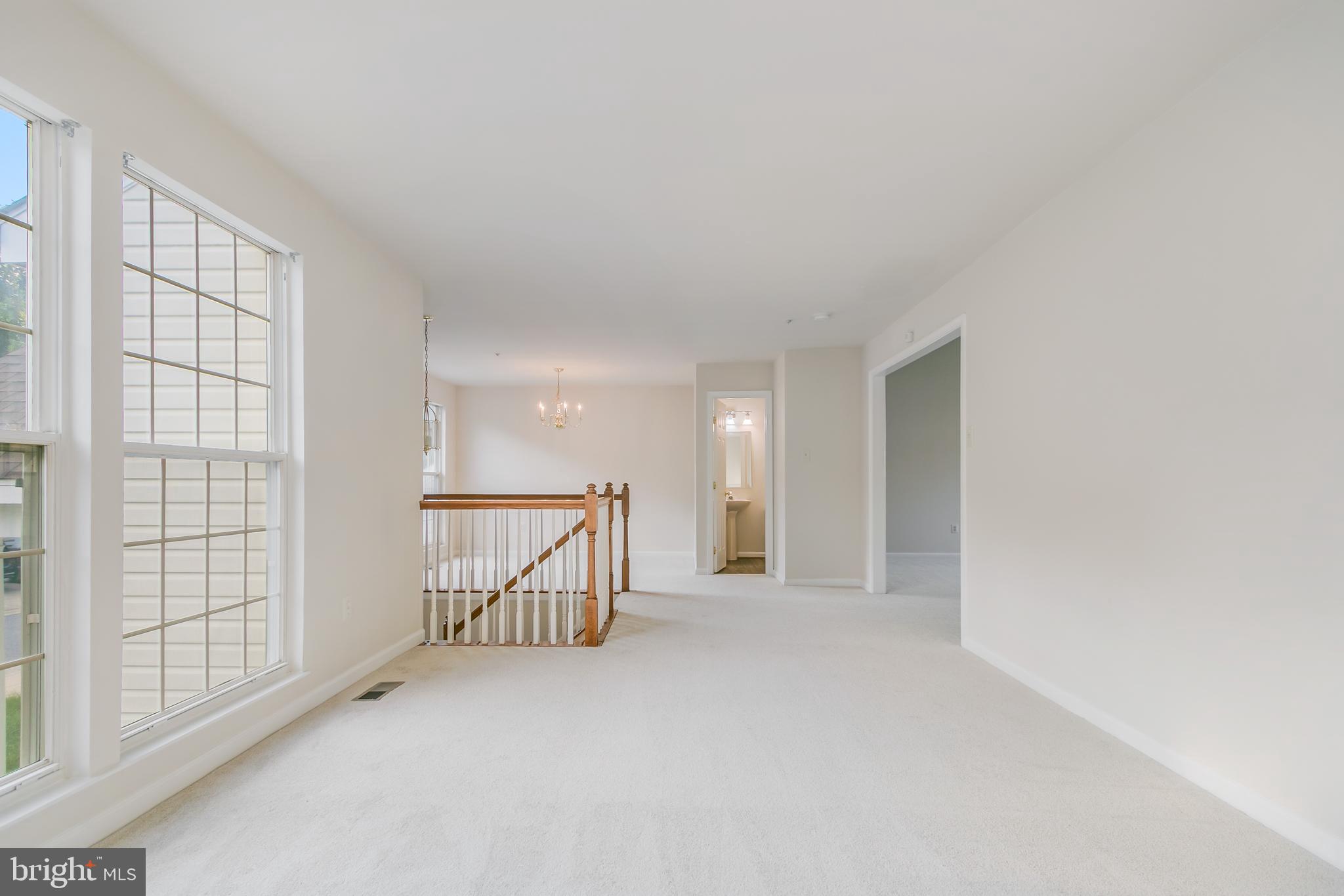 936 Millponds Court Bowie, MD 20721 - Photo 37 of 57 a view of an empty room with a window