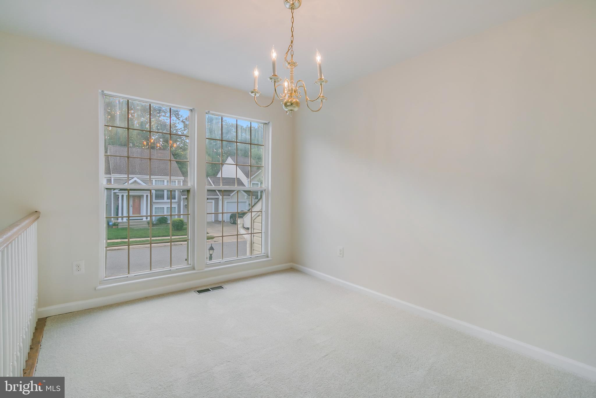 936 Millponds Court Bowie, MD 20721 - Photo 40 of 57 a view of an empty room with a window