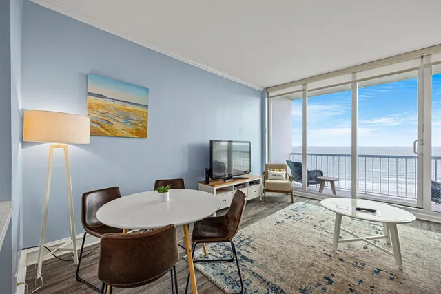 a living room with furniture and a window