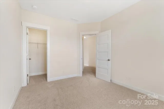 a bathroom with a sink a toilet and shower curtain