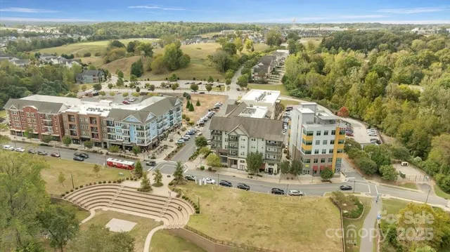 a view of swimming pool and lake from a house
