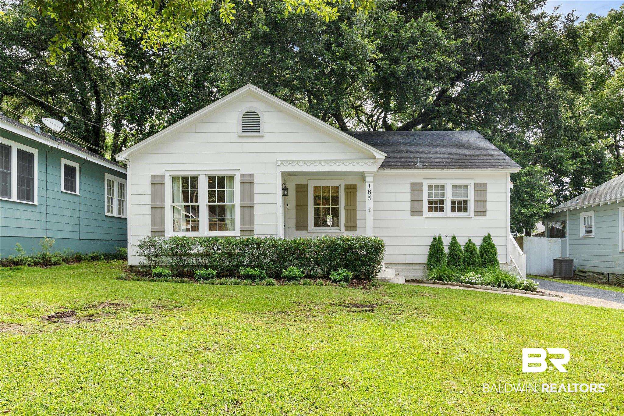 165 Crenshaw Street Mobile, AL 36606 - Photo 1 of 21 View of front of property featuring a front lawn