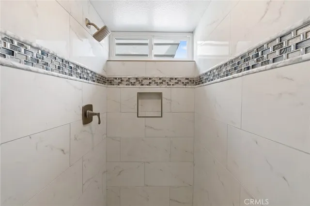 a close view of a bench in bathroom