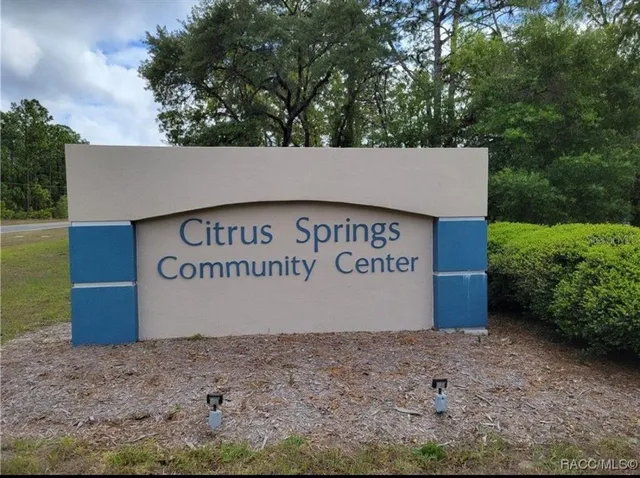 a sign on the side of the road