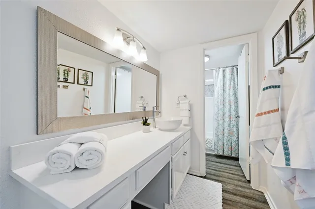 a bathroom with a shower and a toilet