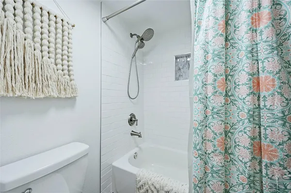 a utility room with washer and dryer