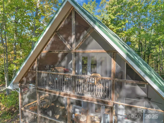 a view of house with yard