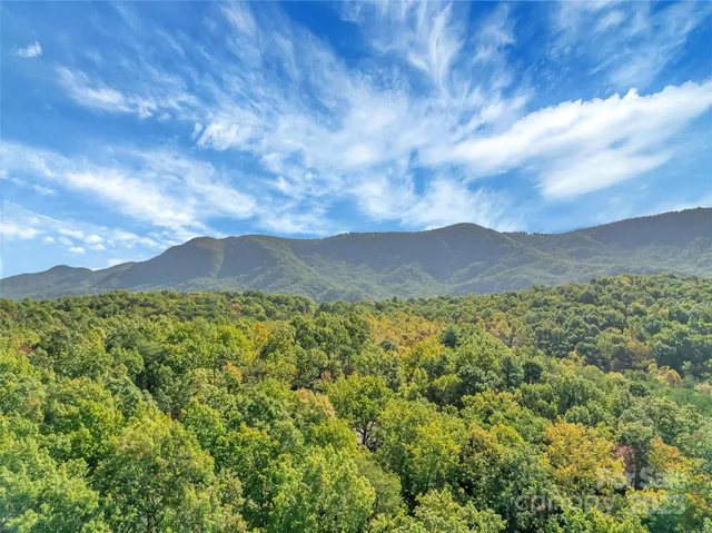 a backyard of a house with seating space