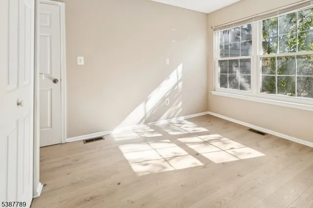 a view of a room with a window