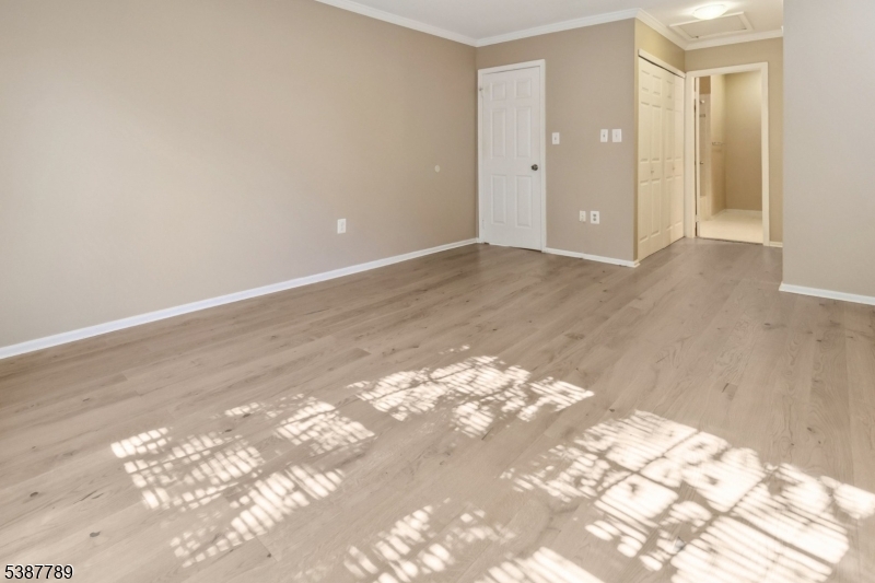 10 Brookline Court Princeton, NJ 08540 - Photo 21 of 31 a view of an empty room and wooden floor