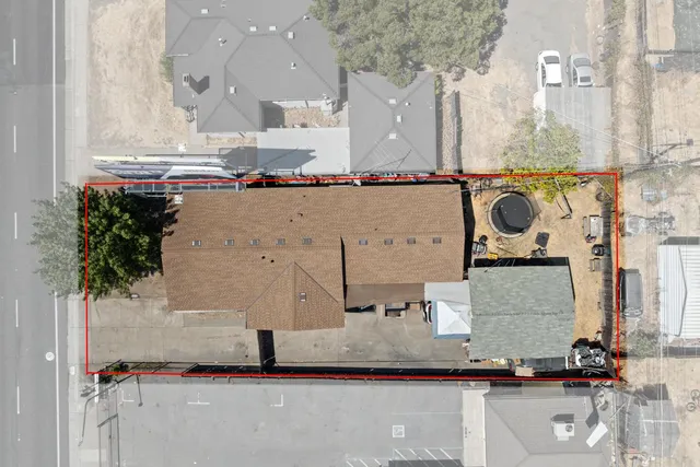 an aerial view of a house with a garden and shower