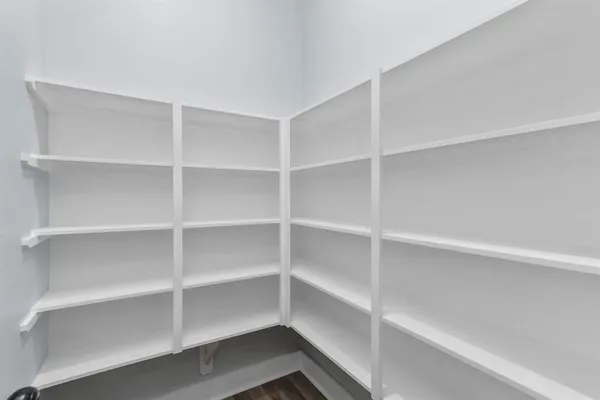 a view of a kitchen with electric appliances