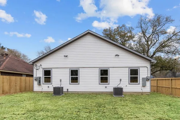 a view of a backyard with a garden