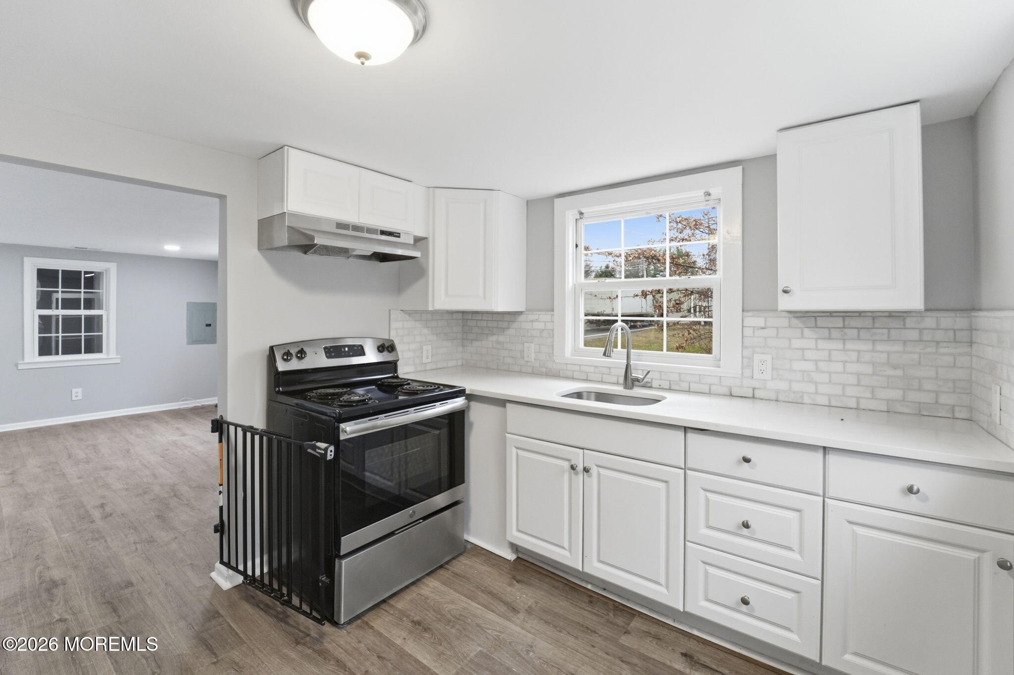 466 Stagecoach Road Millstone Township, NJ 08510 - Photo 5 of 16 a kitchen with a stove and a sink