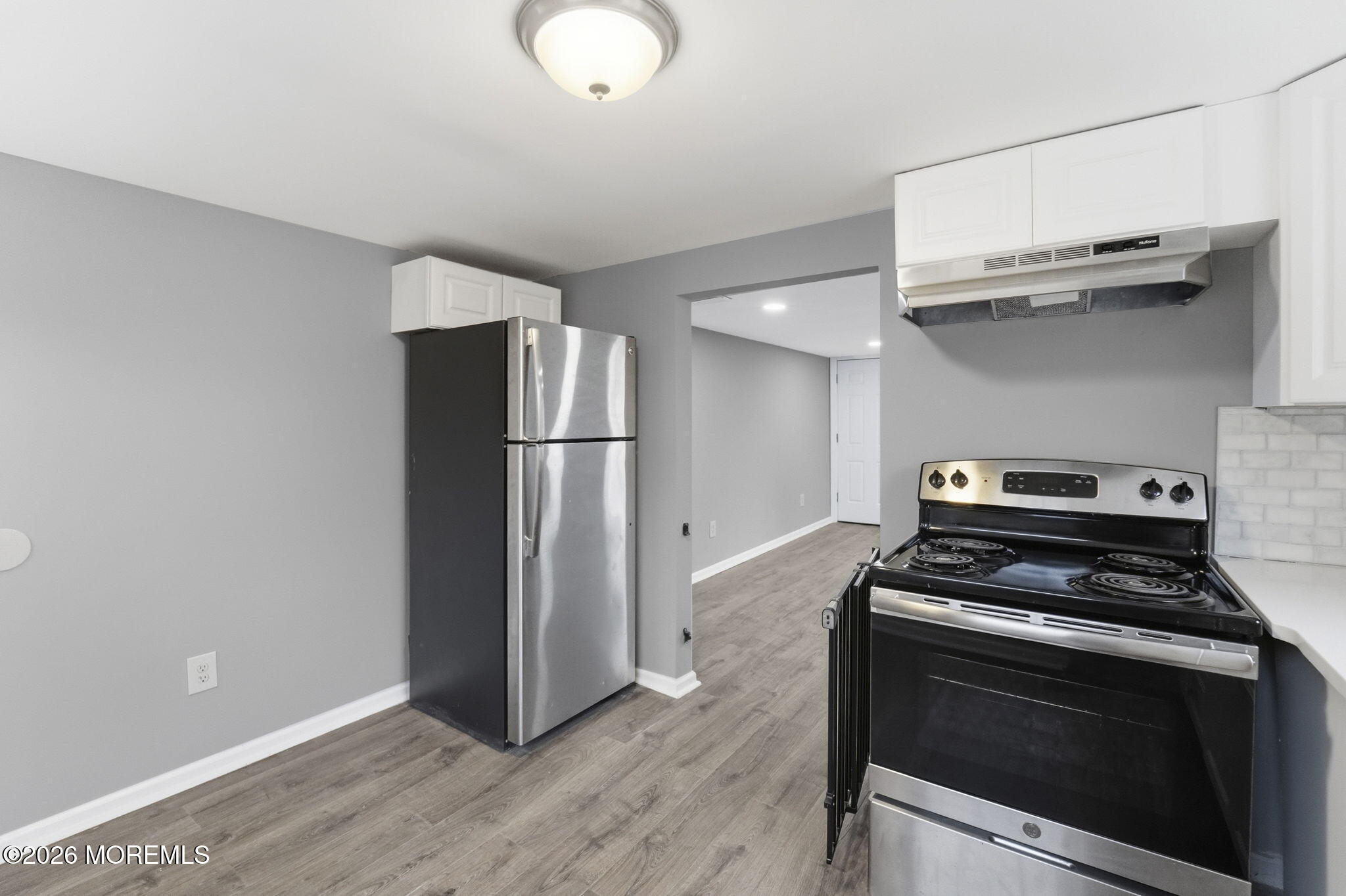 466 Stagecoach Road Millstone Township, NJ 08510 - Photo 6 of 16 a kitchen with cabinets and steel stainless steel appliances