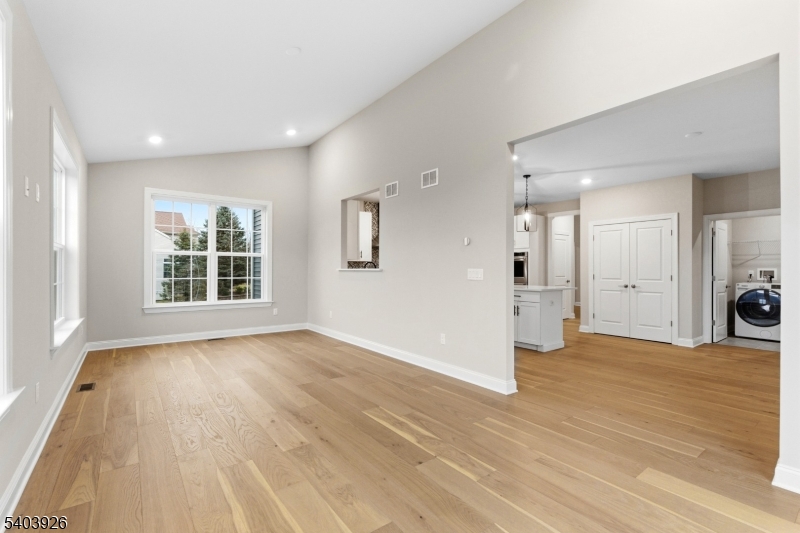 105 Junction Road Hampton, NJ 08827 - Photo 13 of 40 a view of a big room with wooden floor and windows