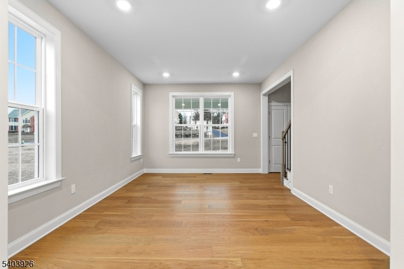 105 Junction Road Hampton, NJ 08827 - Photo 14 of 40 a view of an empty room with a window and wooden floor