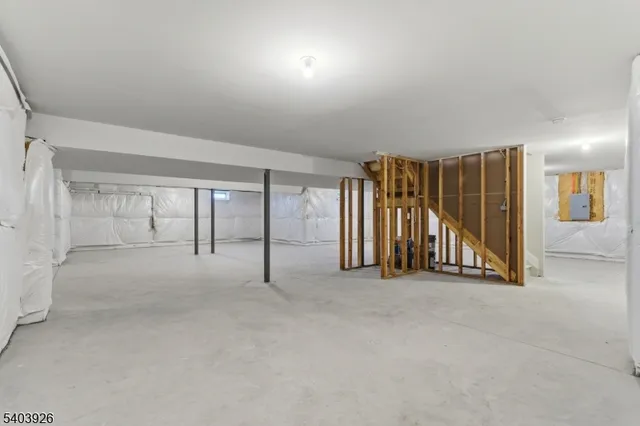 a view of a house with snow on the wall