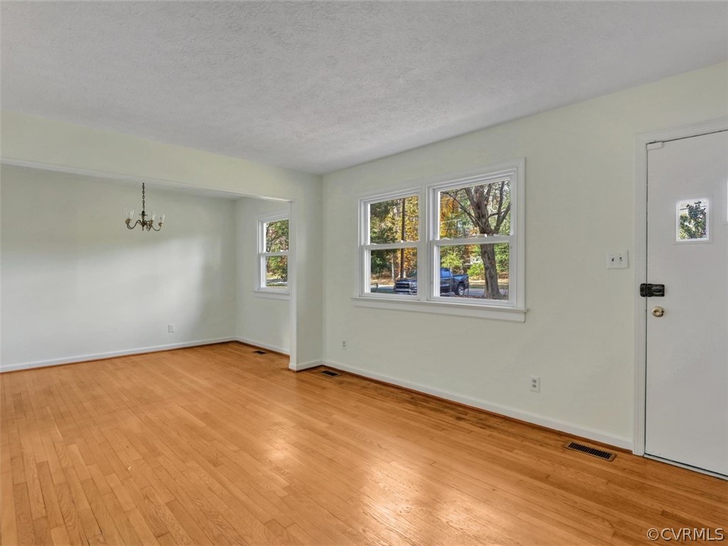 Family Room leading into Dining Room ~ Lots of bea