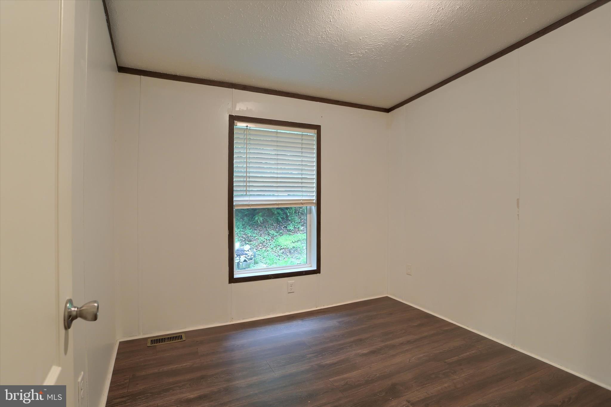 1148 Moulstown Road North Hanover, PA 17331 - Photo 17 of 29 an empty room with wooden floor and windows