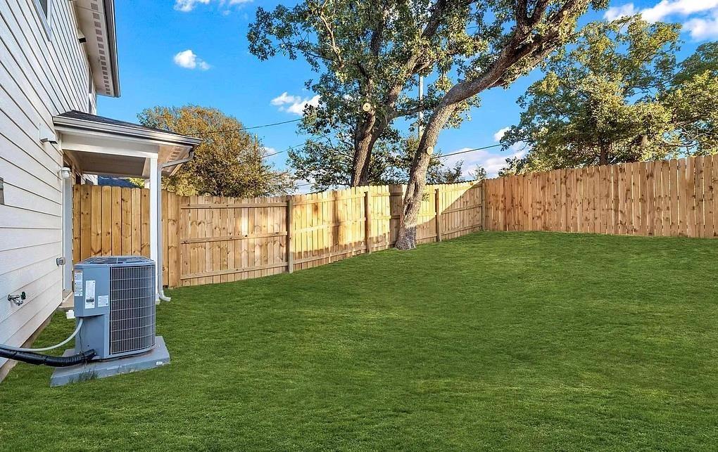 406 East Elm Street Denison, TX 75021 - Photo 20 of 21 a view of a house with a yard and a tree