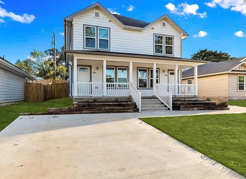 406 East Elm Street Denison, TX 75021 - Photo 2 of 21 a front view of a house with a yard