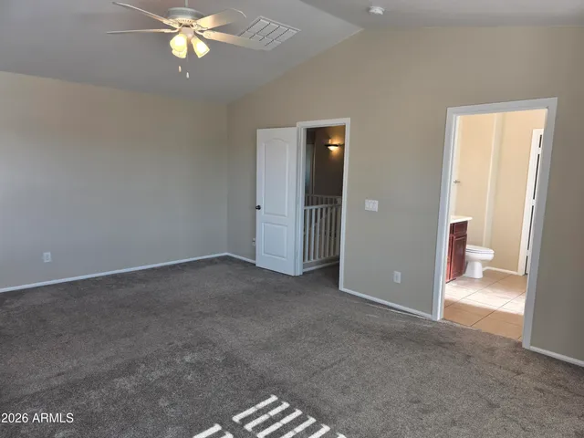 a view of a room with a bathroom