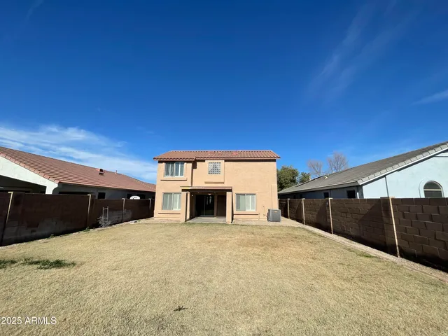 a view of a house with a snow in the yard