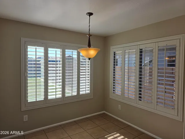 a view of a room with windows
