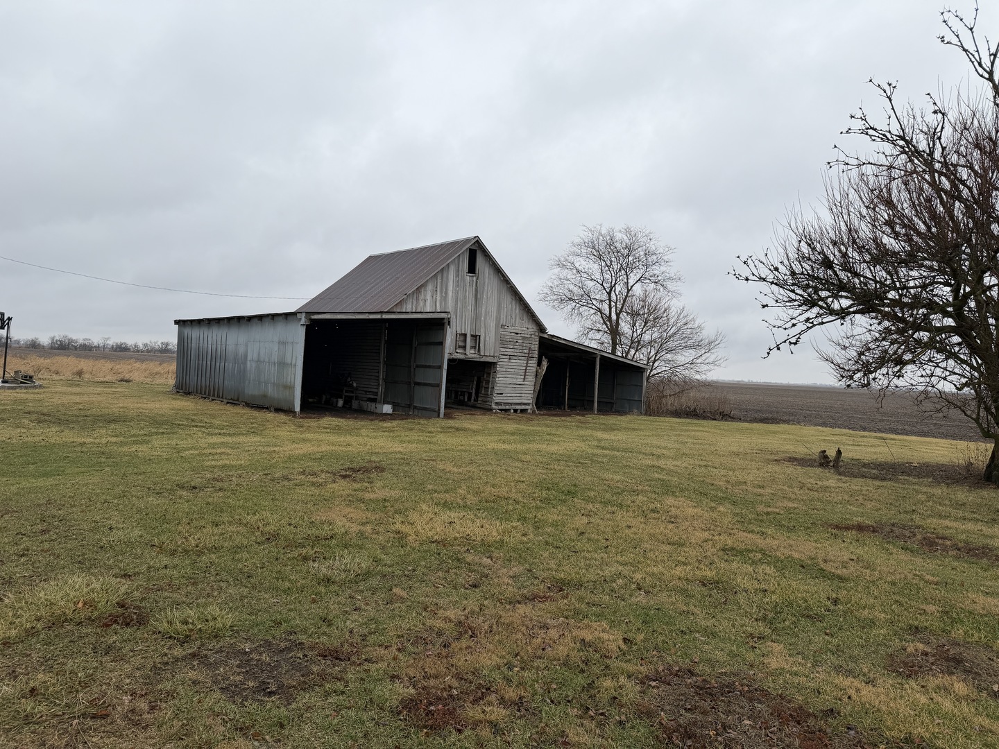 120 East 700 North Road Buckley, IL 60918 - Photo 14 of 21 a front view of a house with a yard and garage