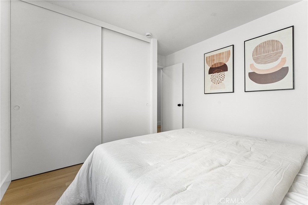 3621 Myrtle Street Irvine, CA 92606 - Photo 31 of 40 a bedroom with a bed and painting on the wall