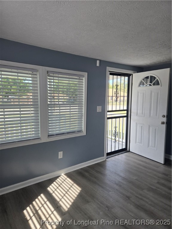 41 Marion Road Lumberton, NC 28358 - Photo 4 of 7 a view of an empty room with wooden floor and a window