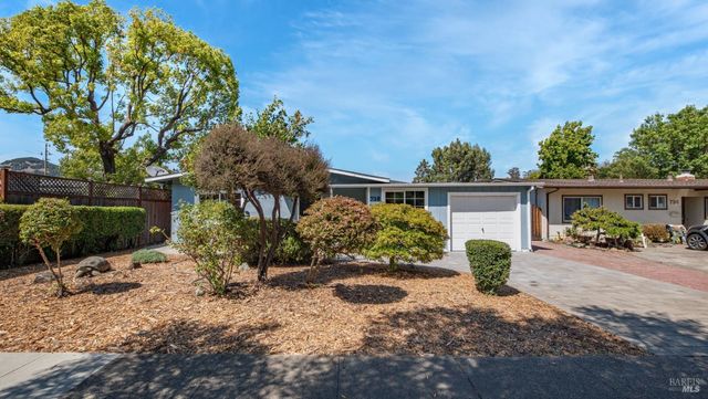 a view of a garden with patio