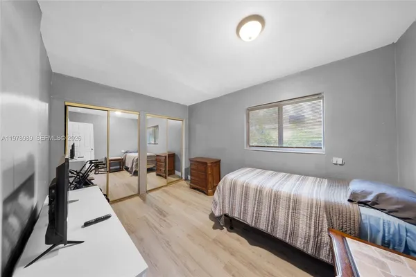 a kitchen with a refrigerator sink and microwave