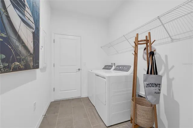 a utility room with dryer and washer