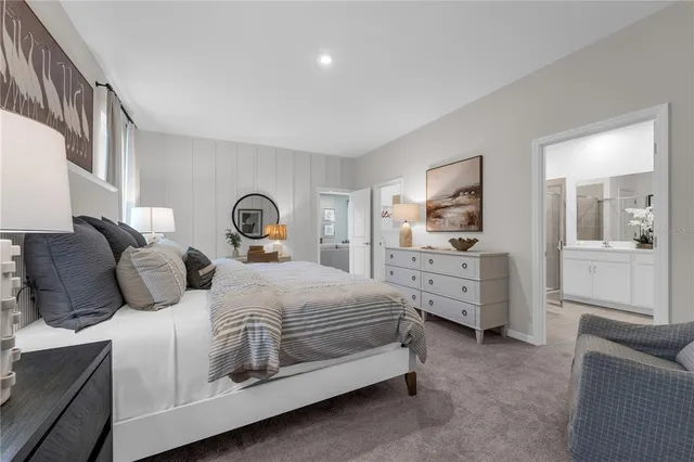 a bedroom with bed and window